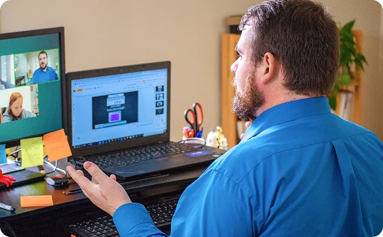 Teacher working with his laptop